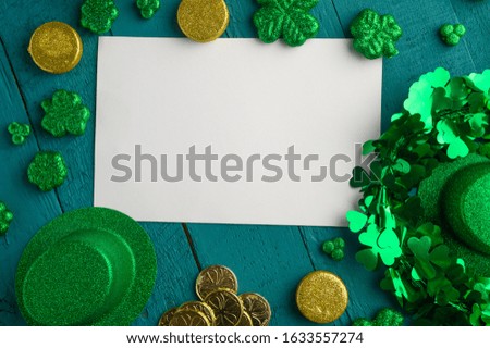 St. Patrick's Day background for congratulation, greeting card for design. Leprechaun coins, clover and hat.