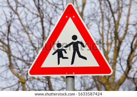 german sign attention children crossing street warning car drivers 