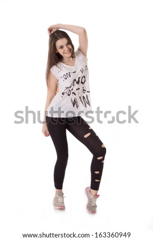 Smiling teenage freestyle dancer girl isolated on white