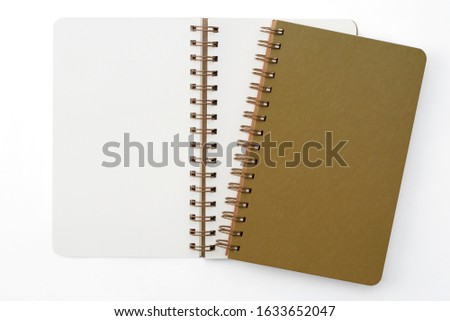 Top view of open spiral blank recycled paper cover notebook on white background additional clipping path.