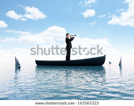 young man thinking  boat with sharks around him Royalty-Free Stock Photo #163365323