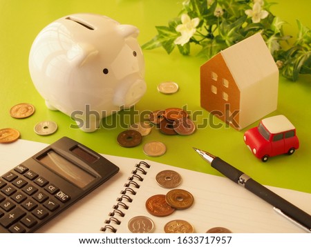 Image of household account book and savings Royalty-Free Stock Photo #1633717957