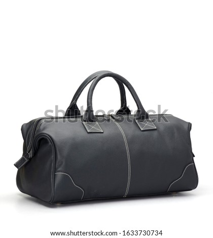 black leather duffle bag isolated on white background Royalty-Free Stock Photo #1633730734