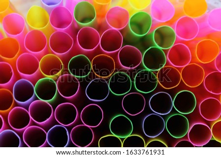 Colorful plastic tubes. Campaign to stop using plastic tubes.