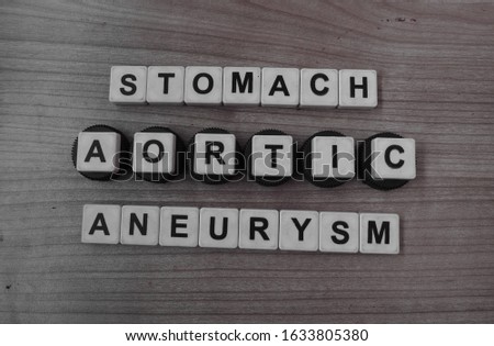 Stomach Aortic Aneurysm, word cube with background.