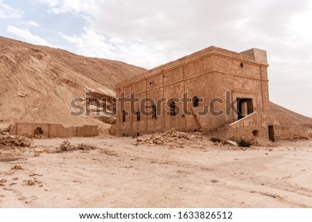 Buildings of the abandoned and dilapidated surface water collecting and treatment plant in Khafs Daghrah, Saudi Arabia