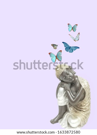 spiritual background for meditation with buddha statue and butterflies 