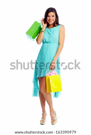 Happy shopping girl with bags. Isolated  white background.