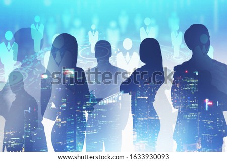 Silhouettes of business people in blurry night city with double exposure of futuristic social network interface. Concept of job search and social connection. Toned image