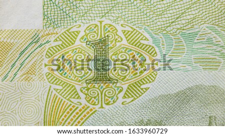 Currency (paper money) detail. Bright design element of money bill. Paper texture.