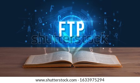 FTP inscription coming out from an open book, digital technology concept