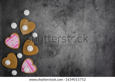 Mother's Day, Valentine's Day, Women's day.Banner of gingerbread hearts on a dark stone background with space for text.Poster for sale in the store.Postcard favorite..Spring festival.copy space.