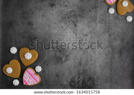 Mother's Day, Valentine's Day, Women's day.Banner of gingerbread hearts on a dark stone background with space for text.Poster for sale in the store.Postcard favorite..Spring festival.copy space.