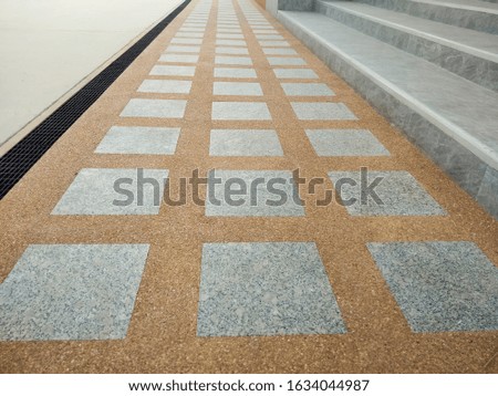view of walk way or side way in front of building texture background.