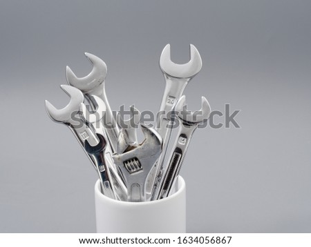 auto repair wrenches on a gray background