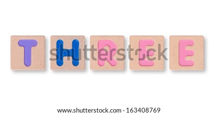 Wording three on wooden block isolated on white background