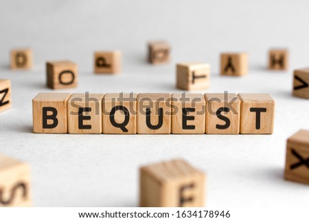 Bequest - words from wooden blocks with letters, Last Will And Testament  bequest concept, white background Royalty-Free Stock Photo #1634178946