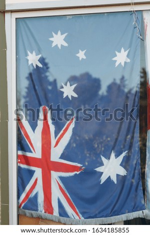 Australian flag hanging in the window