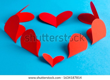 Origami hearts blank for greeting card. Stock photo top view.