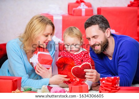 Couple in love and baby daughter. Valentines day concept. Together on valentines day. Lovely family celebrating valentines day. Happy parents. Life can not be better. Family celebrate anniversary.