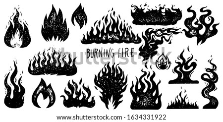 Set of flame and fire in vintage style. Hand drawn engraved monochrome bonfire sketch. Vector illustration for posters, banners and logo.