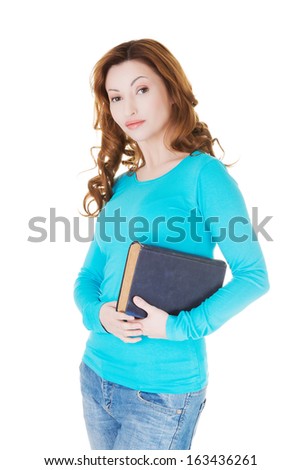 Attractive casual woman with close book.  isolated on white.