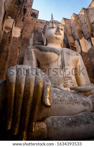 Phra Achana Buddha image, Wat Si Chum in the Sukhothai Historical Park, Thailand.