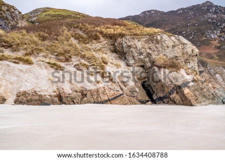 The caves and beach at Maghera Beach near Ardara, County Donegal - Ireland.