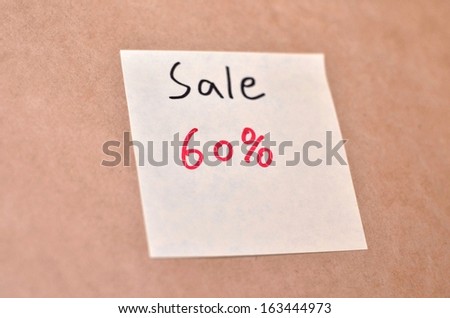 Text sale 60% on the short note texture background