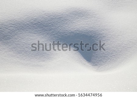 Winter snow falls, naturally abstract patterns are drawn