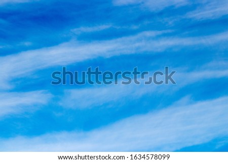 look in the blue sky with some white clouds