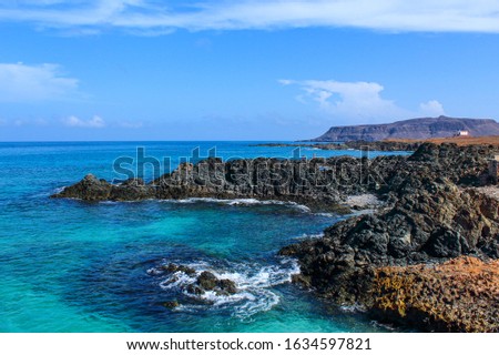 Blue water and blue sky in the Capeverdian coastline. Picture taken late morning at Boa Vista, Cape Verde