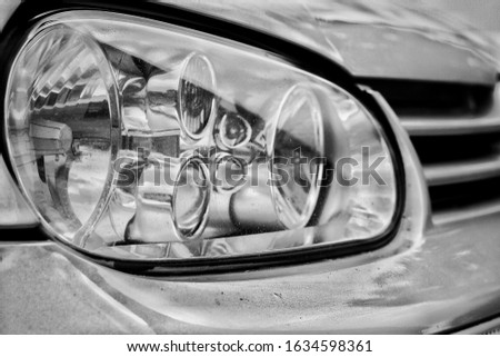 Picture of a car headlight in black and white