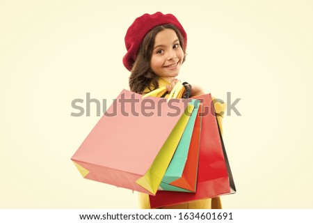 Discounts on specific products. Tricks for profit. Favorite brands and hottest trends. Girl with shopping bags. Shopping and purchase. Black friday. Sale discount. Shopping day. Child hold packages.