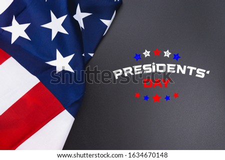 Happy Presidents' Day typography over black background with US American flag border