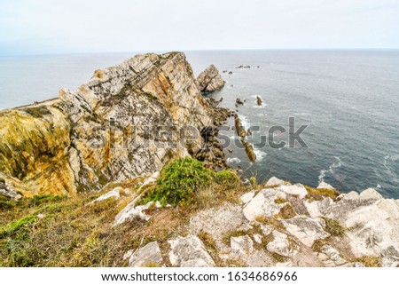 rock and sea, photo as a background , in playa del silencio , silent beach, principado de asturias, spain europe