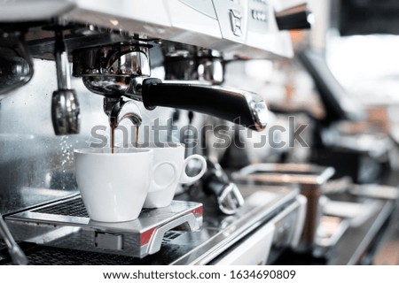 two black coffee morning on coffee maker