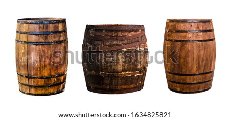 three oak barrels vertical narrow and wide for storing bourbon to give flavor on an isolated background Royalty-Free Stock Photo #1634825821
