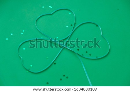 St. Patrick's day, clover on a green background