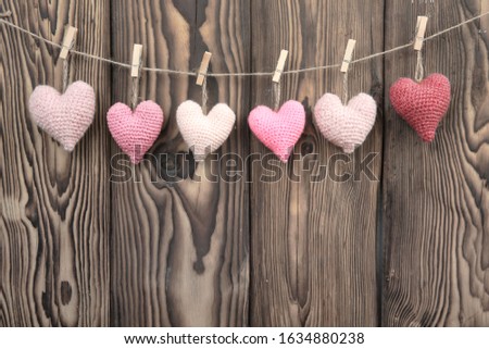 Valentine's day background empty copy space,hearts on wooden backdrop,romantic wallpaper,love concept.