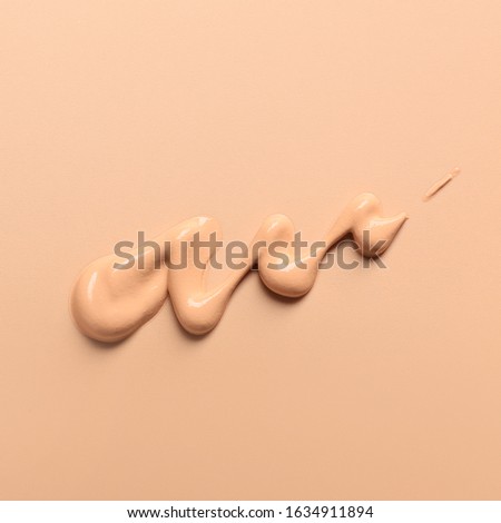 Sample of BB cream on color background Royalty-Free Stock Photo #1634911894