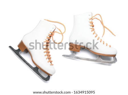 Pair of ice skates on white background