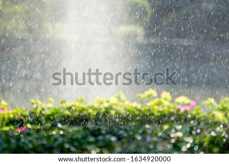abstract splashes of water on natural background.