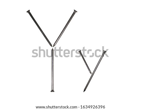 Uppercase and lowercase letters "Y y" laid out of iron nails. Version 2