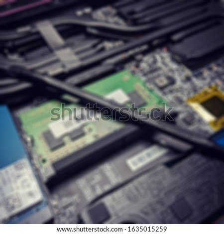 Blurry PC Computer motherboards. Circuit cpu chip mainboard core processor electronics devices. Old Motherboard digital chip. Technology background. 