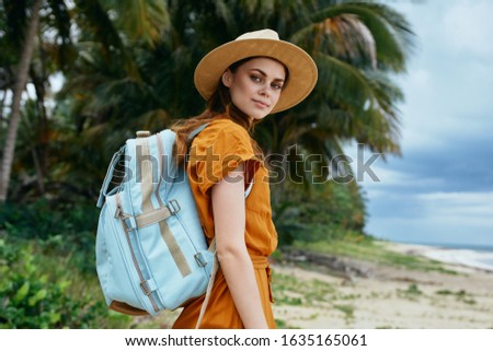 Pretty woman tourist backpack island beach tropics destinations