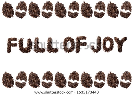 Full Of Joy quote and egg frame made with dried tea leaves placed on white background from the top view can use for your messages