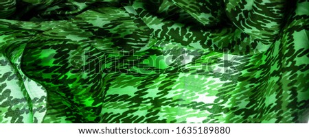 Background design texture, green silk fabric, abstraction, copyright print, military camouflage fleece fabric, your designs will allow you to be military,