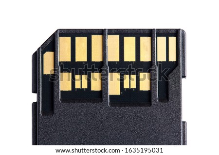 Macro photo of two rows of golden contacts on back of UHS-II high speed memory card isolated on white background close up. Concept of fast modern memory storage disk for 4K 6K or 8K video recording