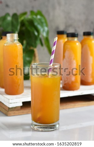 jamu is traditional medicine and herbal drink in indonesia.made from natural materials,such as parts of plants such as root,leaf,flower and etc.this picture is a jamu based on turmeric and tamarind   